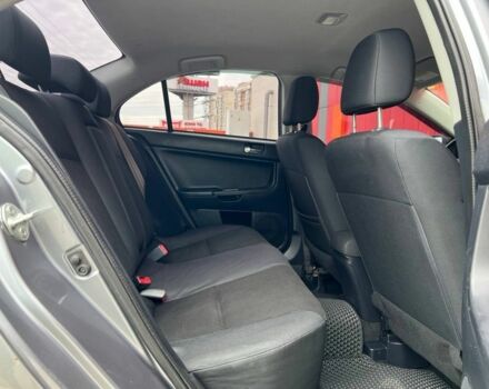 Серый Мицубиси Лансер, объемом двигателя 2 л и пробегом 170 тыс. км за 9500 $, фото 10 на Automoto.ua