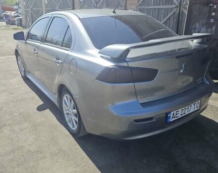 Сірий Міцубісі Lancer, об'ємом двигуна 2 л та пробігом 142 тис. км за 12000 $, фото 2 на Automoto.ua