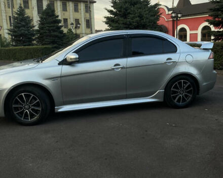 Сірий Міцубісі Lancer, об'ємом двигуна 2 л та пробігом 144 тис. км за 10000 $, фото 12 на Automoto.ua
