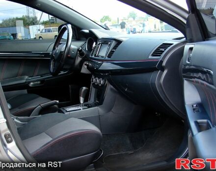 Серый Мицубиси Лансер, объемом двигателя 2 л и пробегом 85 тыс. км за 9700 $, фото 12 на Automoto.ua