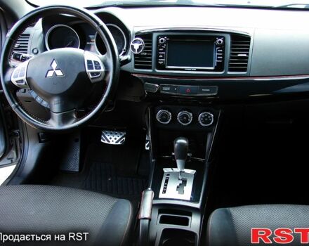 Серый Мицубиси Лансер, объемом двигателя 2 л и пробегом 85 тыс. км за 9700 $, фото 9 на Automoto.ua