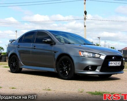 Серый Мицубиси Лансер, объемом двигателя 2 л и пробегом 85 тыс. км за 9700 $, фото 3 на Automoto.ua