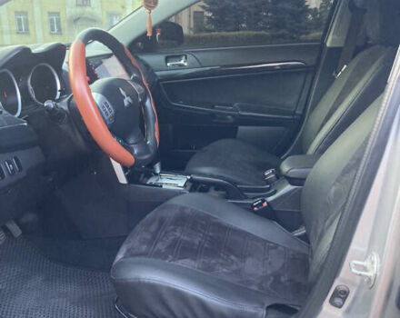 Сірий Міцубісі Lancer, об'ємом двигуна 2 л та пробігом 144 тис. км за 10000 $, фото 22 на Automoto.ua