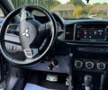 Серый Мицубиси Лансер, объемом двигателя 2 л и пробегом 88 тыс. км за 10000 $, фото 10 на Automoto.ua