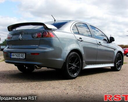 Серый Мицубиси Лансер, объемом двигателя 2 л и пробегом 85 тыс. км за 9700 $, фото 5 на Automoto.ua