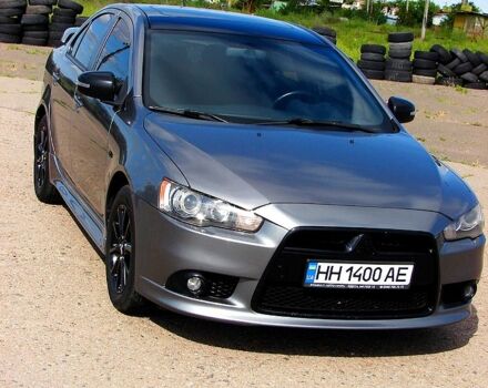 Серый Мицубиси Лансер, объемом двигателя 2 л и пробегом 85 тыс. км за 9700 $, фото 2 на Automoto.ua