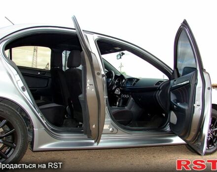 Серый Мицубиси Лансер, объемом двигателя 2 л и пробегом 85 тыс. км за 9700 $, фото 11 на Automoto.ua