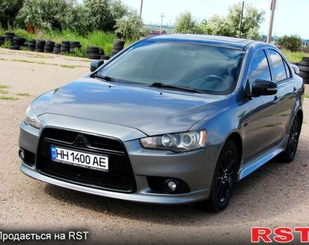 Серый Мицубиси Лансер, объемом двигателя 2 л и пробегом 85 тыс. км за 9700 $, фото 1 на Automoto.ua