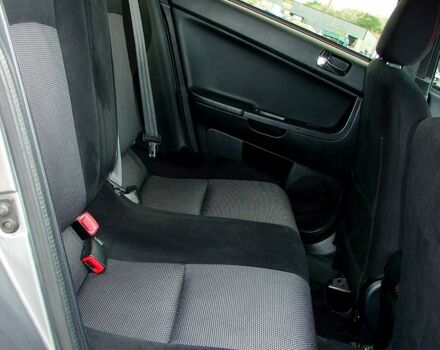 Серый Мицубиси Лансер, объемом двигателя 2 л и пробегом 85 тыс. км за 9700 $, фото 10 на Automoto.ua