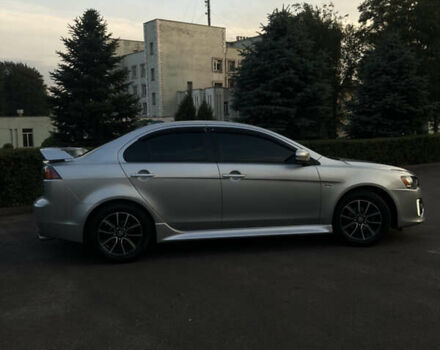 Сірий Міцубісі Lancer, об'ємом двигуна 2 л та пробігом 144 тис. км за 10000 $, фото 8 на Automoto.ua