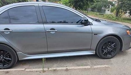 Серый Мицубиси Лансер, объемом двигателя 2 л и пробегом 56 тыс. км за 10500 $, фото 20 на Automoto.ua