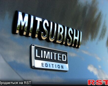 Серый Мицубиси Лансер, объемом двигателя 2 л и пробегом 85 тыс. км за 9700 $, фото 6 на Automoto.ua