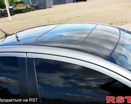 Серый Мицубиси Лансер, объемом двигателя 2 л и пробегом 85 тыс. км за 9700 $, фото 4 на Automoto.ua