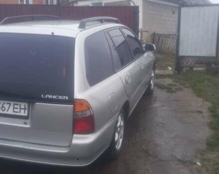 Серый Мицубиси Лансер, объемом двигателя 1.6 л и пробегом 432 тыс. км за 2200 $, фото 1 на Automoto.ua