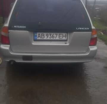 Серый Мицубиси Лансер, объемом двигателя 1.6 л и пробегом 432 тыс. км за 2200 $, фото 5 на Automoto.ua