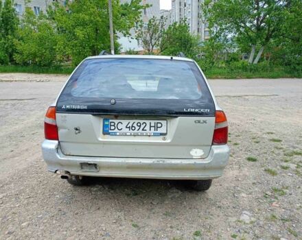Сірий Міцубісі Lancer, об'ємом двигуна 1.6 л та пробігом 499 тис. км за 1050 $, фото 9 на Automoto.ua