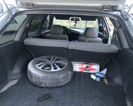 Сірий Міцубісі Lancer, об'ємом двигуна 1.6 л та пробігом 386 тис. км за 1800 $, фото 6 на Automoto.ua