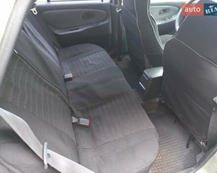 Серый Мицубиси Лансер, объемом двигателя 1.6 л и пробегом 282 тыс. км за 2401 $, фото 5 на Automoto.ua