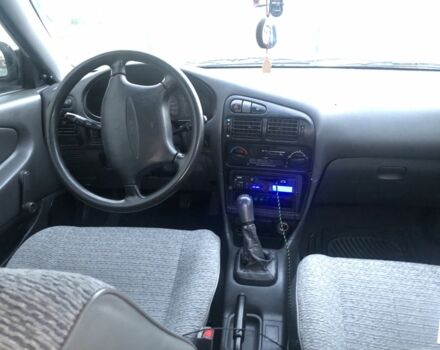 Сірий Міцубісі Lancer, об'ємом двигуна 1.6 л та пробігом 386 тис. км за 1800 $, фото 5 на Automoto.ua