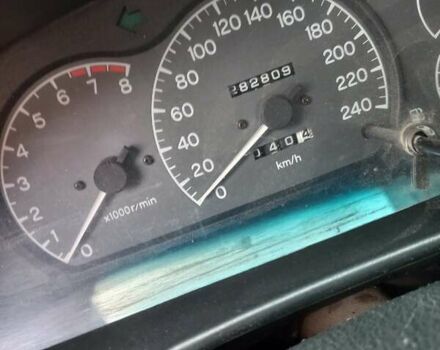 Серый Мицубиси Лансер, объемом двигателя 1.6 л и пробегом 282 тыс. км за 2401 $, фото 9 на Automoto.ua