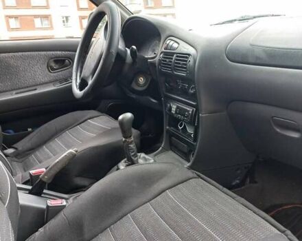 Серый Мицубиси Лансер, объемом двигателя 1.6 л и пробегом 282 тыс. км за 2401 $, фото 4 на Automoto.ua