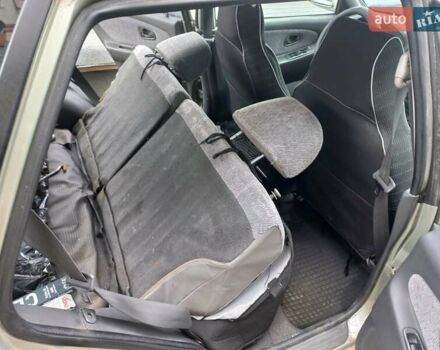 Серый Мицубиси Лансер, объемом двигателя 1.6 л и пробегом 282 тыс. км за 2401 $, фото 6 на Automoto.ua