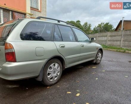 Серый Мицубиси Лансер, объемом двигателя 1.6 л и пробегом 282 тыс. км за 2401 $, фото 1 на Automoto.ua