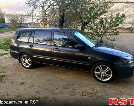 Сірий Міцубісі Lancer, об'ємом двигуна 2 л та пробігом 270 тис. км за 4200 $, фото 3 на Automoto.ua