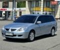 Сірий Міцубісі Lancer, об'ємом двигуна 1.58 л та пробігом 246 тис. км за 4300 $, фото 1 на Automoto.ua