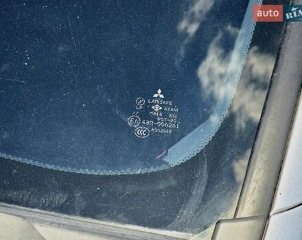Сірий Міцубісі Lancer, об'ємом двигуна 1.58 л та пробігом 246 тис. км за 4300 $, фото 9 на Automoto.ua