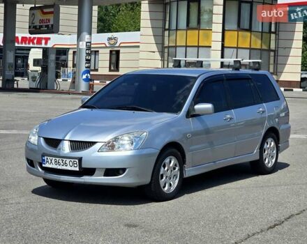 Сірий Міцубісі Lancer, об'ємом двигуна 1.58 л та пробігом 246 тис. км за 4300 $, фото 1 на Automoto.ua