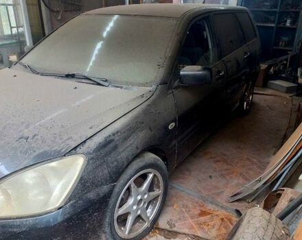 Серый Мицубиси Лансер, объемом двигателя 1.6 л и пробегом 234 тыс. км за 2500 $, фото 6 на Automoto.ua