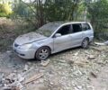 Сірий Міцубісі Lancer, об'ємом двигуна 1.6 л та пробігом 252 тис. км за 1999 $, фото 1 на Automoto.ua