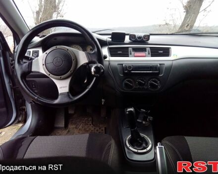 Серый Мицубиси Лансер, объемом двигателя 2 л и пробегом 352 тыс. км за 3950 $, фото 13 на Automoto.ua