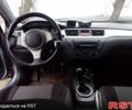 Серый Мицубиси Лансер, объемом двигателя 2 л и пробегом 352 тыс. км за 3950 $, фото 13 на Automoto.ua