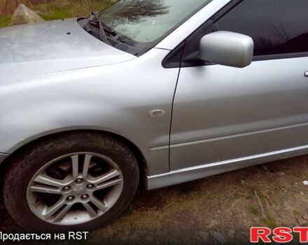 Серый Мицубиси Лансер, объемом двигателя 2 л и пробегом 352 тыс. км за 3950 $, фото 5 на Automoto.ua