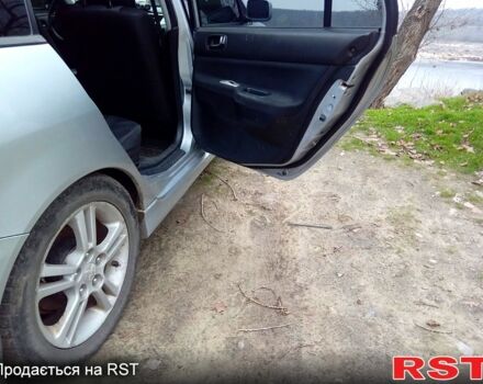 Серый Мицубиси Лансер, объемом двигателя 2 л и пробегом 352 тыс. км за 3950 $, фото 9 на Automoto.ua