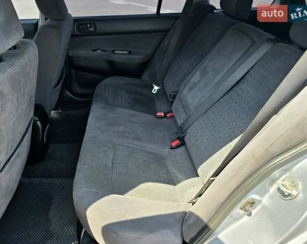 Сірий Міцубісі Lancer, об'ємом двигуна 1.58 л та пробігом 246 тис. км за 4300 $, фото 14 на Automoto.ua