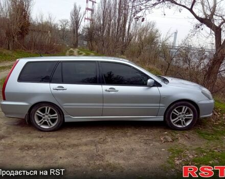 Серый Мицубиси Лансер, объемом двигателя 2 л и пробегом 352 тыс. км за 3950 $, фото 1 на Automoto.ua