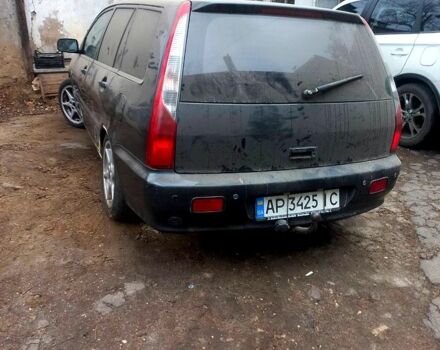 Серый Мицубиси Лансер, объемом двигателя 1.6 л и пробегом 234 тыс. км за 2500 $, фото 8 на Automoto.ua