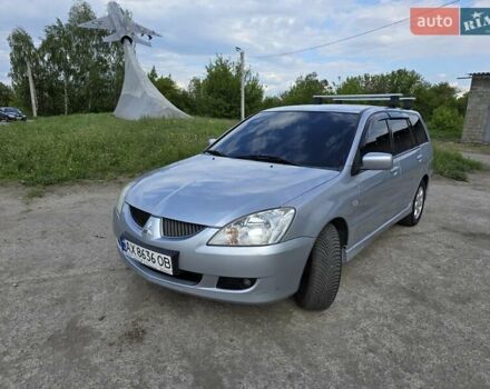 Сірий Міцубісі Lancer, об'ємом двигуна 1.6 л та пробігом 244 тис. км за 4300 $, фото 1 на Automoto.ua