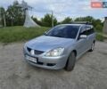 Сірий Міцубісі Lancer, об'ємом двигуна 1.6 л та пробігом 244 тис. км за 4300 $, фото 1 на Automoto.ua