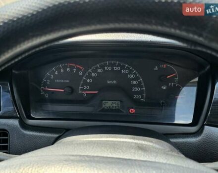 Сірий Міцубісі Lancer, об'ємом двигуна 1.58 л та пробігом 246 тис. км за 4300 $, фото 22 на Automoto.ua