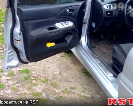 Серый Мицубиси Лансер, объемом двигателя 2 л и пробегом 352 тыс. км за 3950 $, фото 10 на Automoto.ua