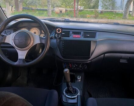 Сірий Міцубісі Lancer, об'ємом двигуна 2 л та пробігом 270 тис. км за 4200 $, фото 4 на Automoto.ua