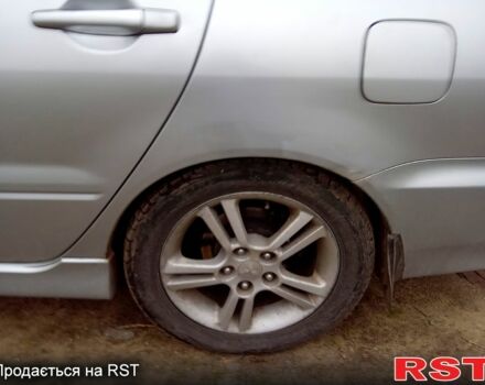 Серый Мицубиси Лансер, объемом двигателя 2 л и пробегом 352 тыс. км за 3950 $, фото 6 на Automoto.ua