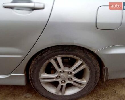 Сірий Міцубісі Lancer, об'ємом двигуна 2 л та пробігом 352 тис. км за 3950 $, фото 5 на Automoto.ua
