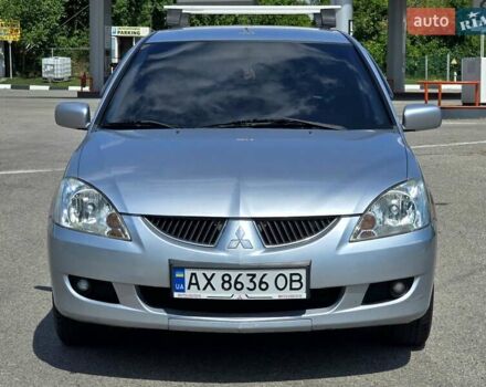 Сірий Міцубісі Lancer, об'ємом двигуна 1.58 л та пробігом 246 тис. км за 4300 $, фото 2 на Automoto.ua