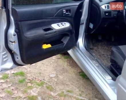 Сірий Міцубісі Lancer, об'ємом двигуна 2 л та пробігом 352 тис. км за 3950 $, фото 9 на Automoto.ua