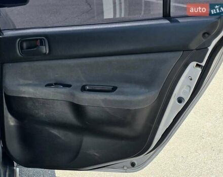Сірий Міцубісі Lancer, об'ємом двигуна 1.58 л та пробігом 246 тис. км за 4300 $, фото 17 на Automoto.ua